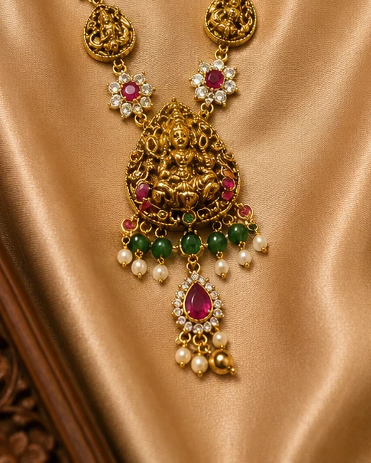 Lakshmi pendant with green beads and pearl-style drops